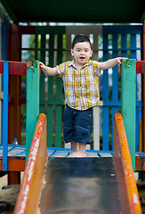 Image showing boy ready to slide