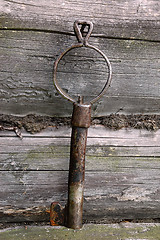 Image showing Forged Vintage Key On The Wall