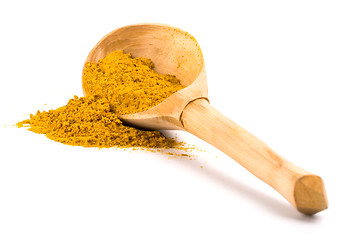 Image showing yellow turmeric on wooden spoon