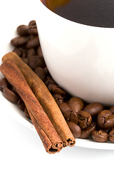 Image showing cup of coffee, cinnamon and beans