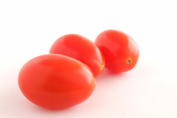 Image showing Three baby tomatoes