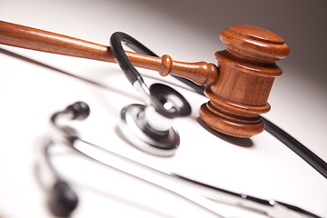 Image showing Gavel and Stethoscope on Gradated Background