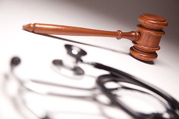 Image showing Gavel and Stethoscope on Gradated Background