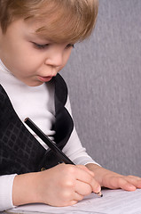 Image showing Boy writing