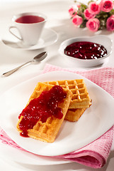 Image showing Belgian waffles, jam and tea 