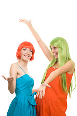 Image showing Two surprised young women with color hair 