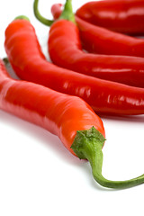 Image showing five red chilli peppers