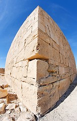 Image showing Fisheye distortion view of corner of ancient stone building 