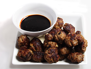 Image showing Meatballs and brown sauce dip