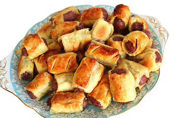 Image showing Plate of homemade sausage rolls