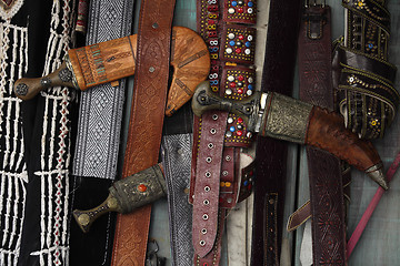 Image showing Daggers and belts
