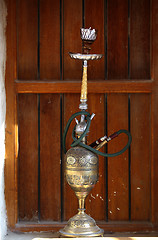 Image showing Hookah pipe and window