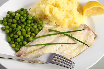 Image showing Baked fish with peas and potato