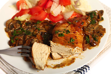 Image showing Chicken with mushroom sauce and salad