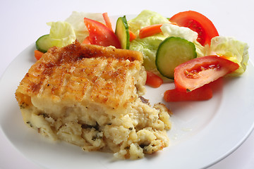 Image showing English fish pie and salad