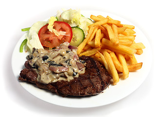 Image showing Steak and mushroom sauce