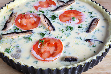 Image showing Oven ready quiche from side