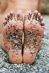 Image showing Foots with sand on it