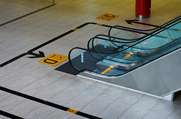 Image showing Escalator and sign to departure gate in airport