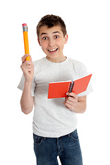 Image showing Bright Student with Pencil and Notebook