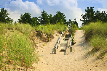 Image showing Wooden stairs over dunes at beach