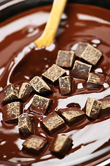 Image showing Melting chocolate and spoon