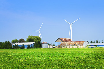 Image showing Wind turbines on farm