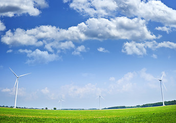 Image showing Wind turbines in field