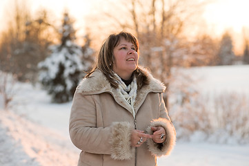 Image showing Women on winters sunset