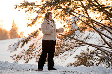 Image showing Women on winters sunset