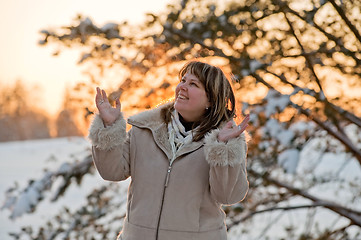 Image showing Women on winters sunset