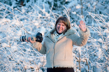 Image showing Women with photo camera