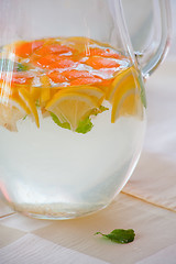 Image showing Pitcher with water and fruits