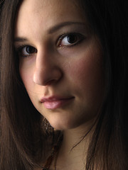 Image showing Young brunette on black