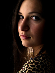 Image showing Young brunette on black