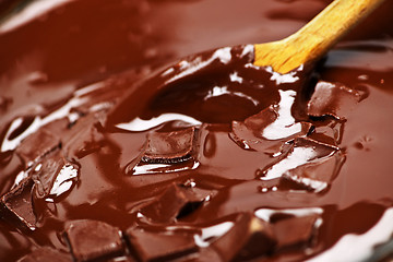 Image showing Melting chocolate and spoon