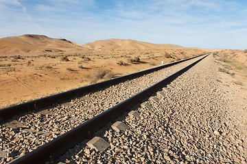 Image showing Straight railway in the desert to the horizon