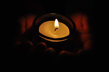 Image showing Candle in a childshand