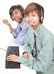 Image showing Asian support center agents