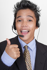 Image showing Call center agent thumbs up portrait