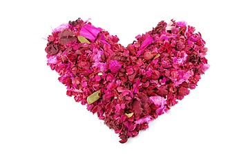 Image showing Pink heart made of dried petals, leaves, flowers for Valentine's Day