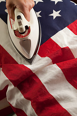 Image showing Ironing Out the Wrinkles of Flag