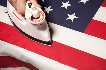 Image showing Ironing Out the Wrinkles of Flag