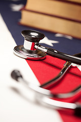 Image showing Stethoscope and Books on American Flag