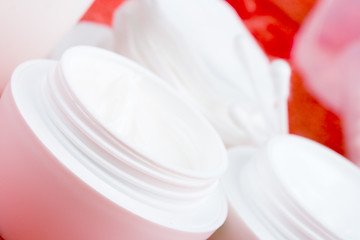 Image showing facial cream and cotton pads