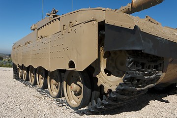 Image showing Tracks and wheels closeup of new Israeli tank in museum