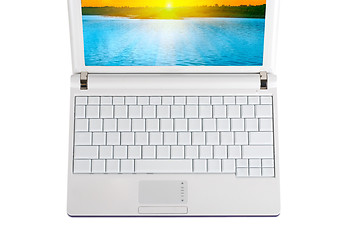 Image showing White laptop with empty keys