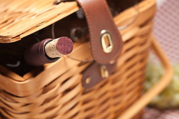 Image showing Picnic Basket, Wine Bottle and Empty Glasses