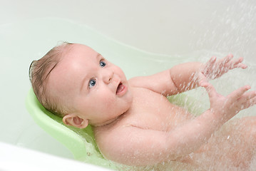 Image showing washing baby
