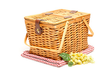 Image showing Picnic Basket, Grapes and Folded Blanket Isolated